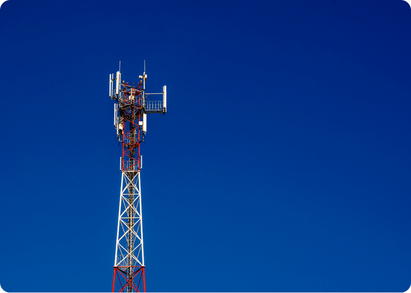 Tall metal tower under bright sky