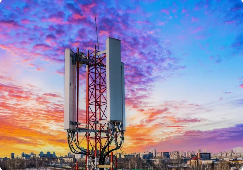 Antenna structure silhouetted by dramatic sunset
